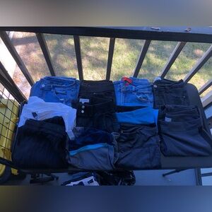 Women’s size 10(large) mystery bundle of 11 pairs of leggings and pants